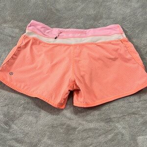 Lululemon Pop Orange Speed Wagon Shorts